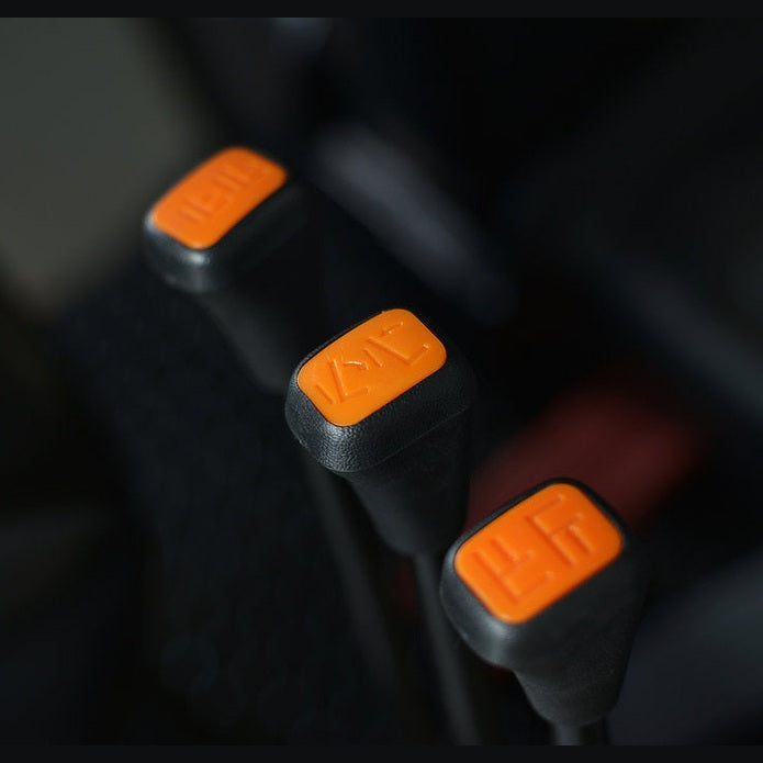 Hydraulic control lever grips on EKKO EK16A-138 with orange function-icon caps