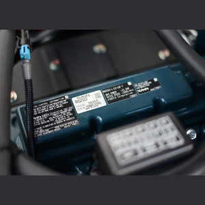 Kubota WG2503 engine nameplate showing 41.3 kW at 2,800 rpm and emission control information