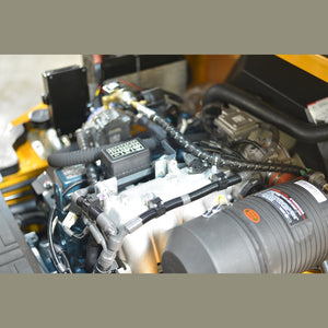 EK35LP engine bay with intake manifold, wiring harness, and fuse box