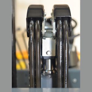 Top-of-mast detail on EKKO EK50LP showing twin mast pulleys and routed hydraulic hoses
